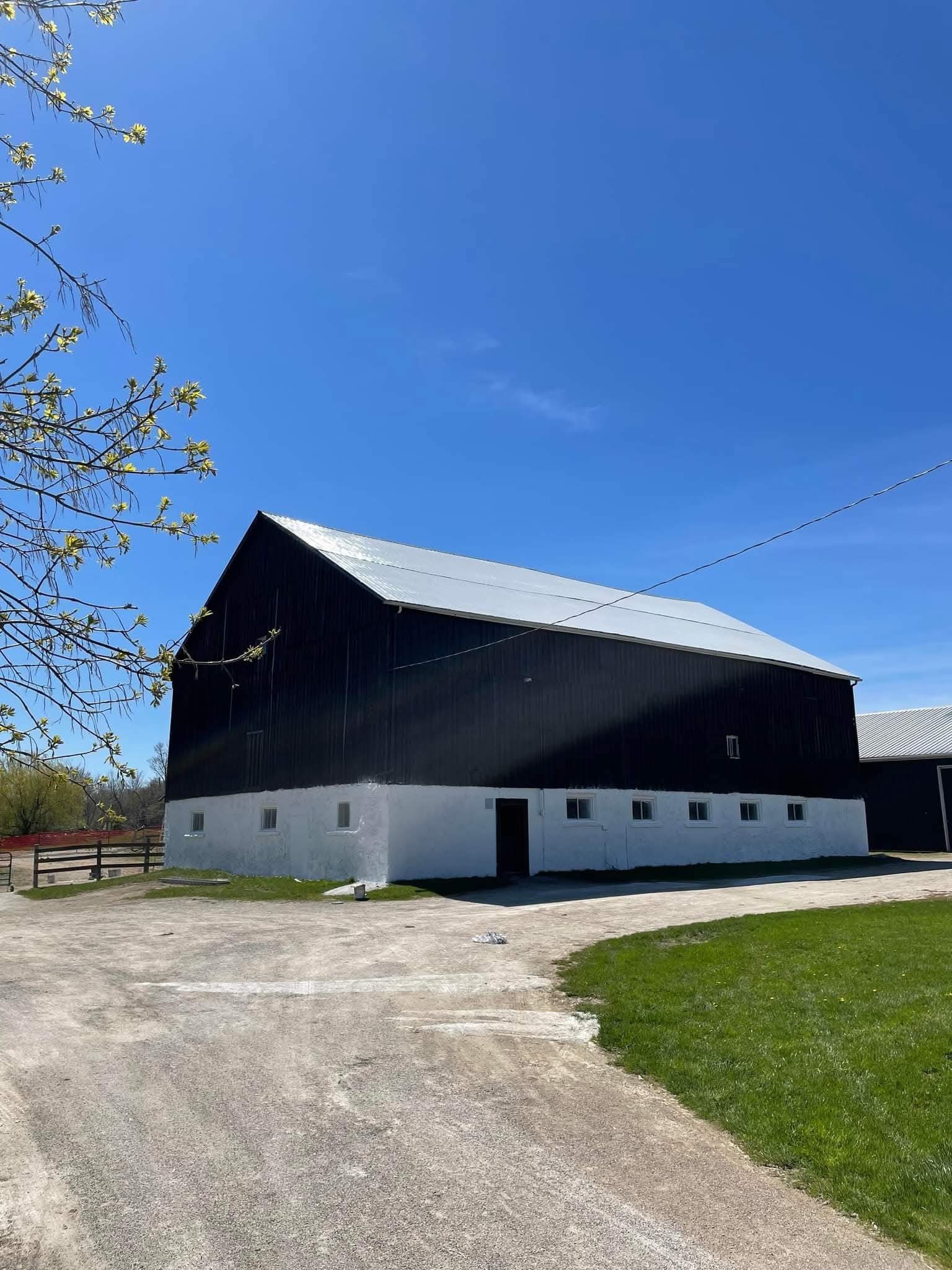 Foundation, wood siding, and metal roof coating